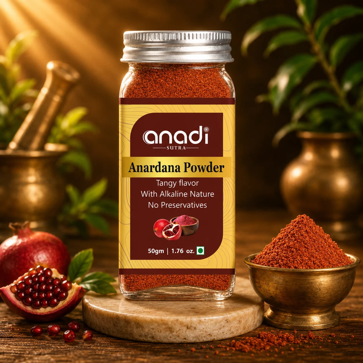 Pomegranate seed powder jar with maroon label and red powder, plus bowl of spice