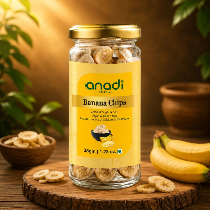 Banana chips jar with gold cap, clear glass filled with freeze-dried banana slices