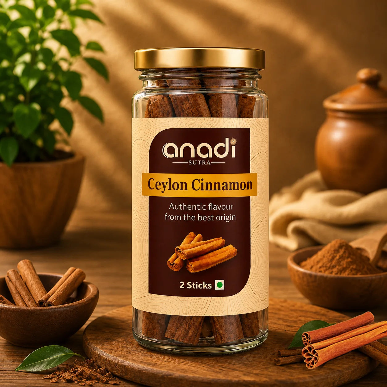 Cinnamon sticks in clear glass jar with gold metal lid