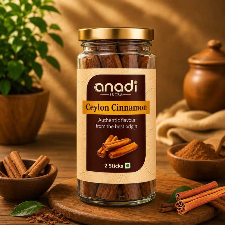 Cinnamon sticks in clear glass jar with gold metal lid