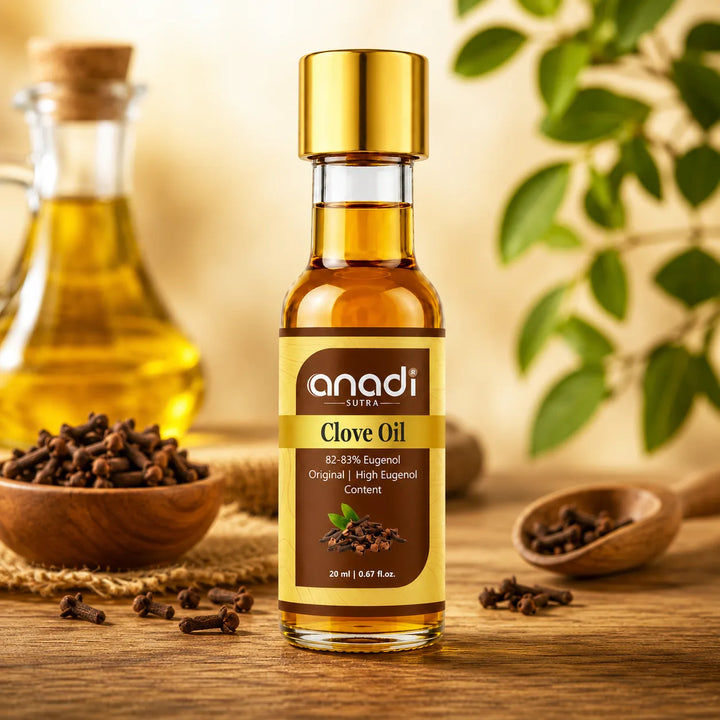 Close-up of 20 ml clove oil bottle with gold cap and amber liquid, anadi sutra