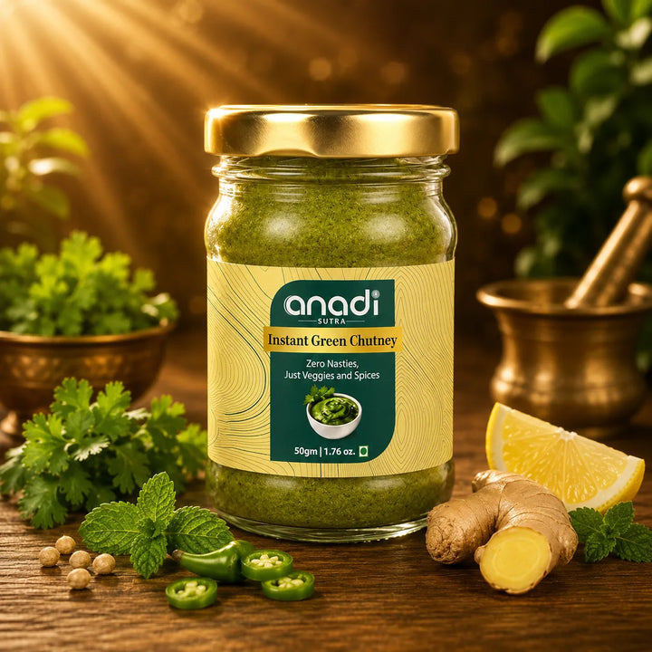 Jar of instant green chutney close-up with ginger, lemon, and fresh herbs