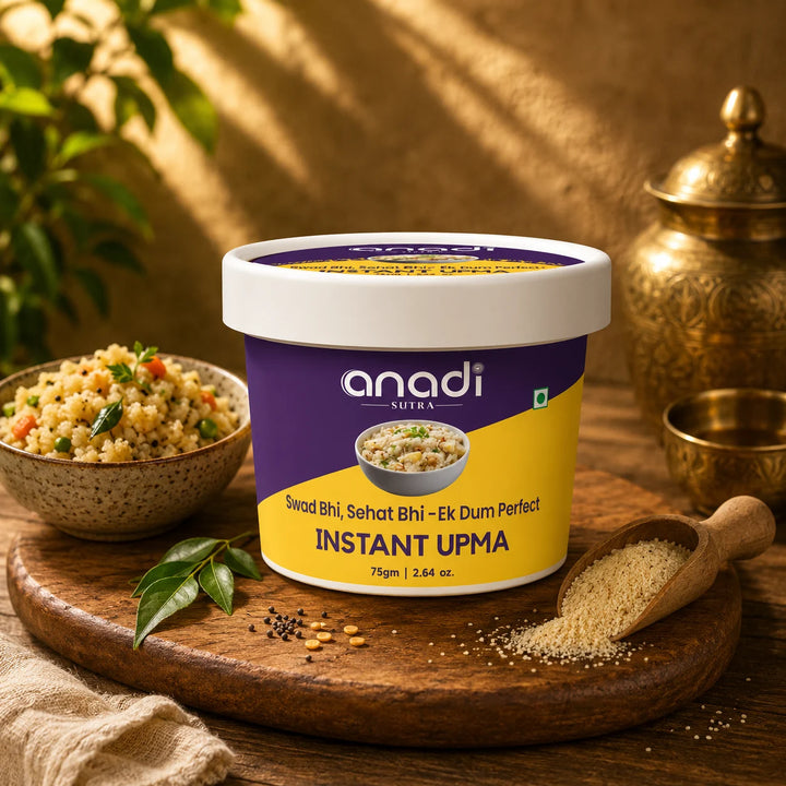 Instant upma cup with lid on wooden board with bowl of upma and herbs.