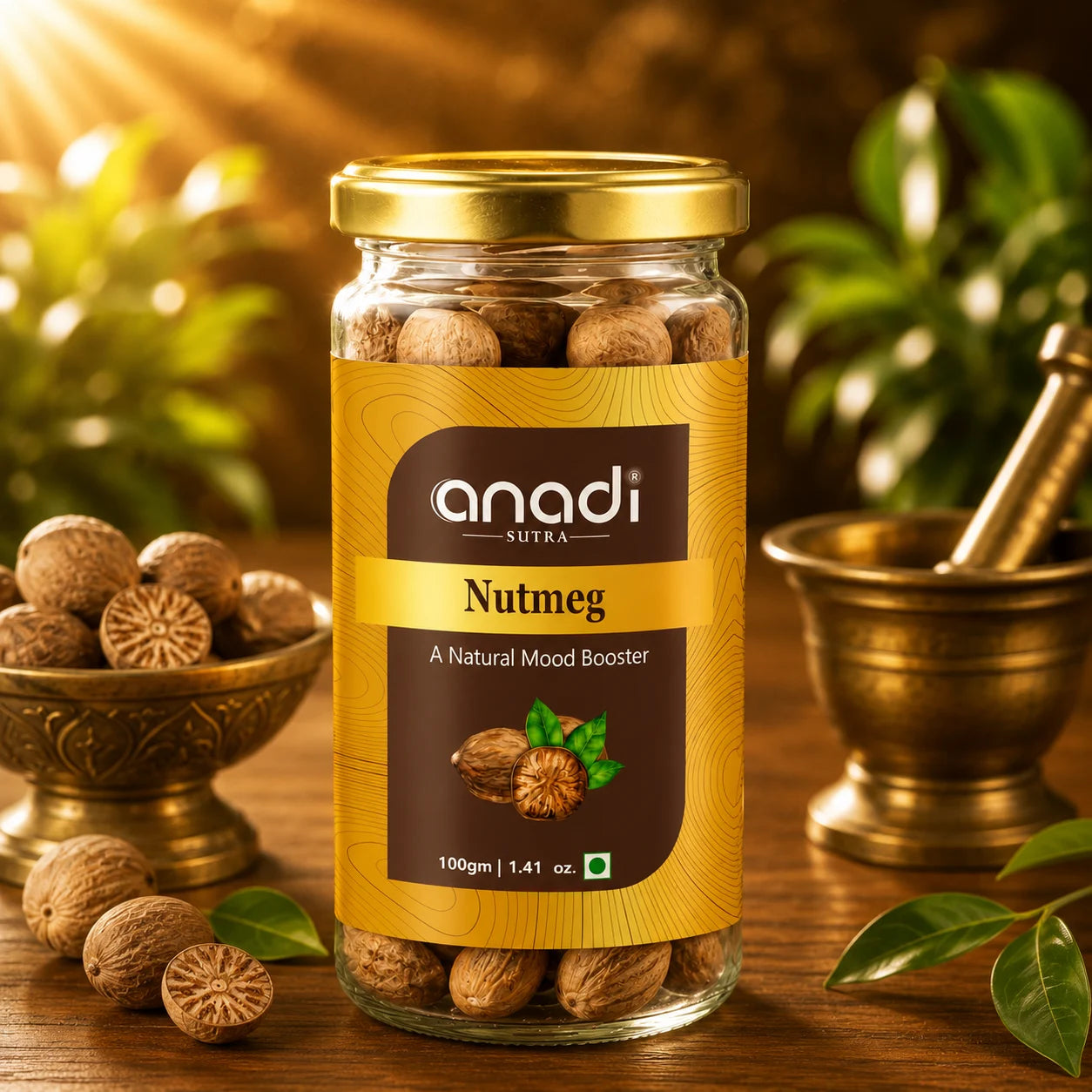 Nutmeg jar with gold lid and Anadi Sutra label, whole nutmeg seeds close-up
