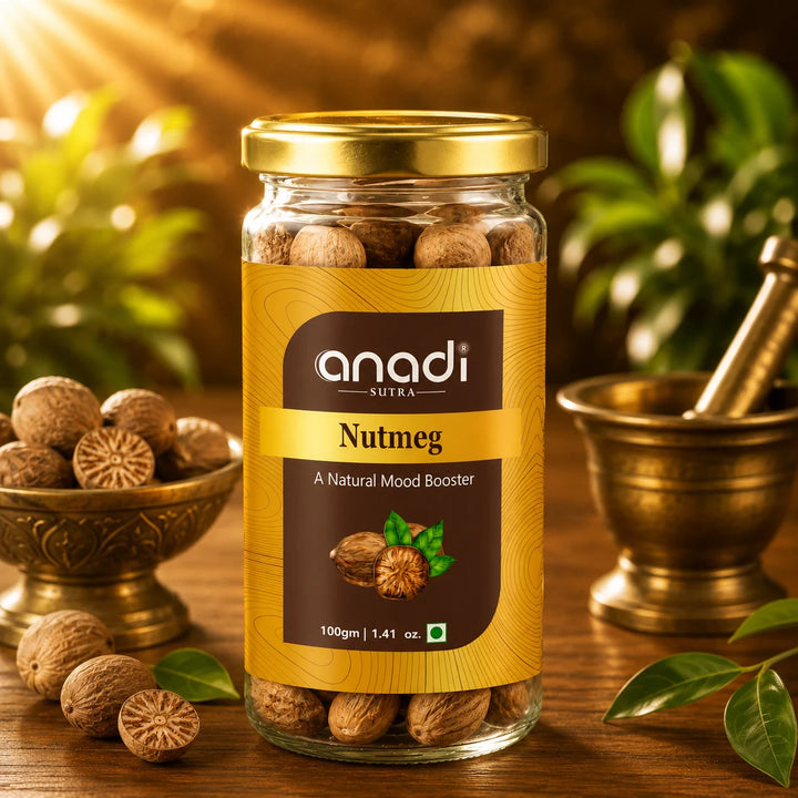 Nutmeg jar with gold lid and Anadi Sutra label, whole nutmeg seeds close-up