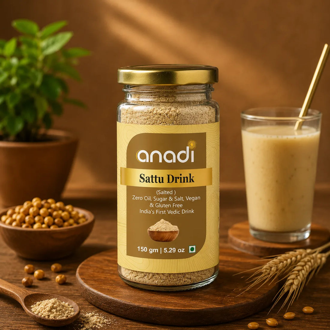 anadi Sattu drink premix jar, clear glass with dark gold lid and beige label