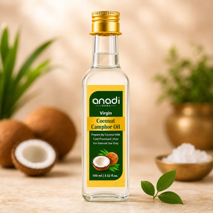 Virgin coconut camphor oil bottle with gold cap and yellow front label, 100 ml