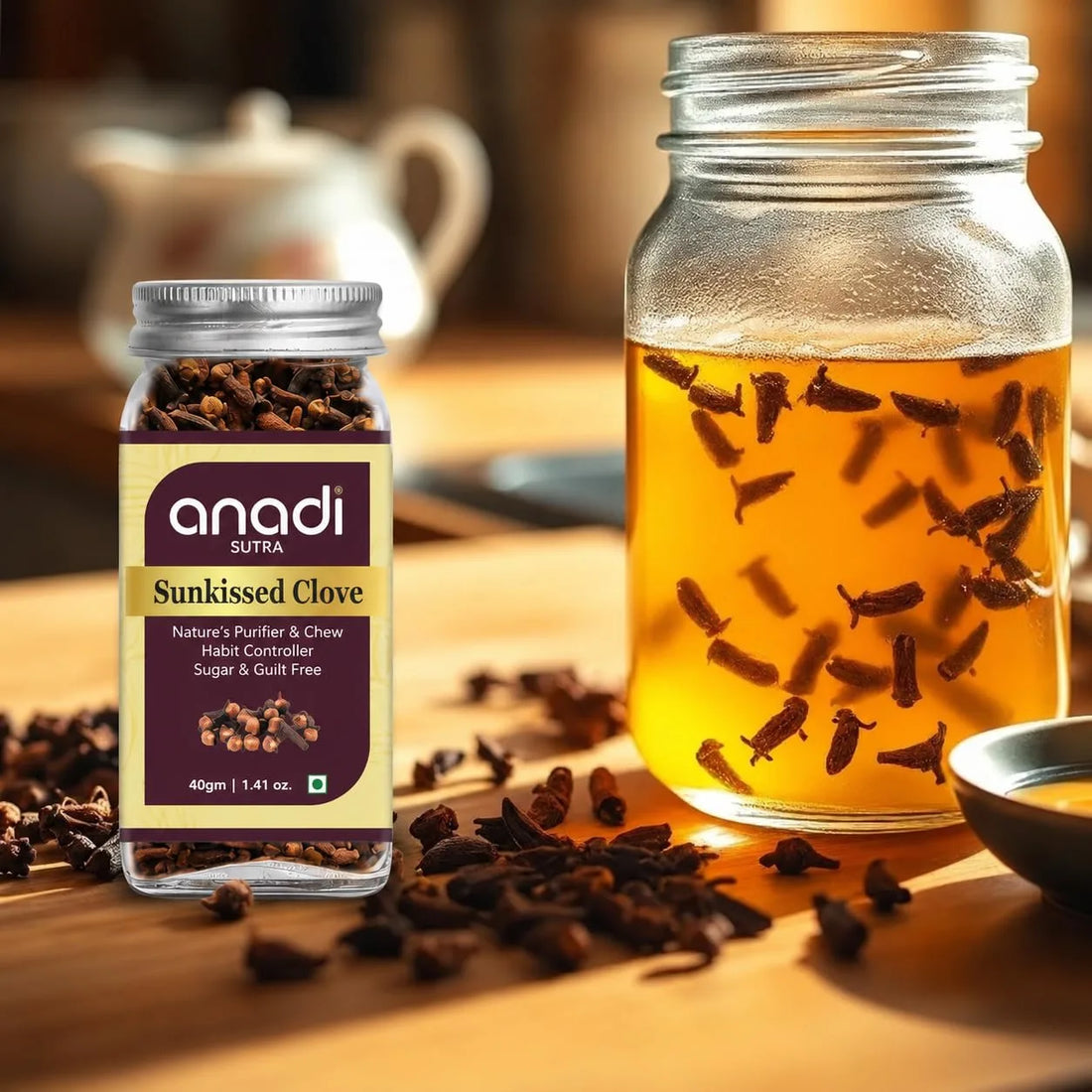 Sunkissed clove jar with screw-top lid; roasted clove buds floating in amber liquid