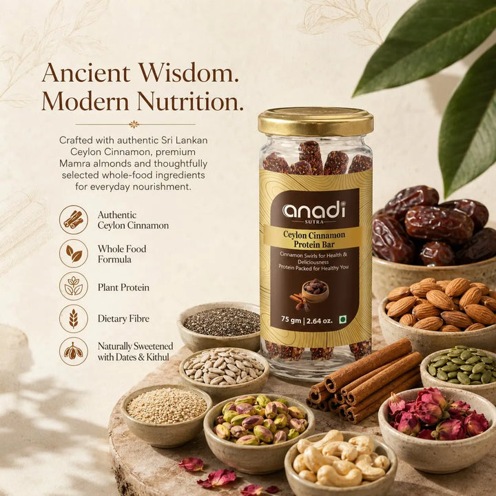 Protein bar jar with gold lid surrounded by nuts, seeds, and dried dates