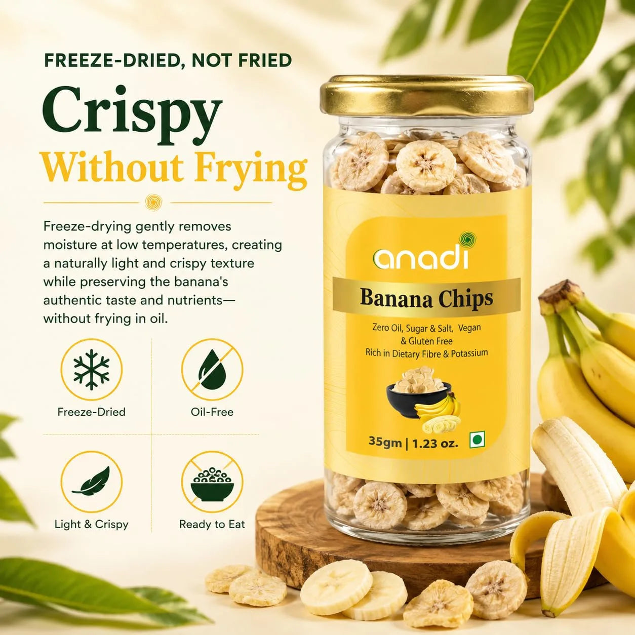 Banana chips jar with gold lid, yellow label, surrounded by banana chips and banana pieces