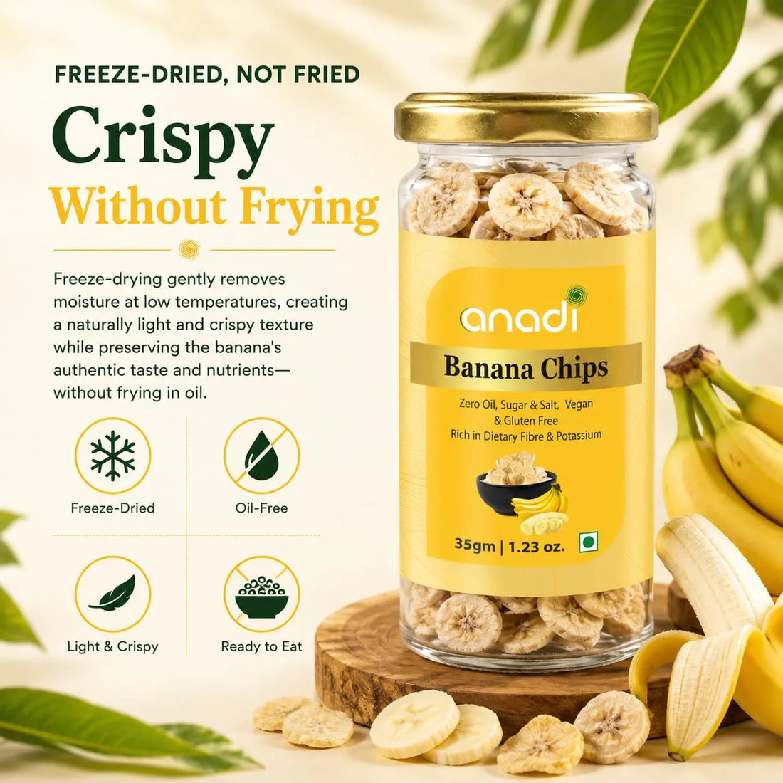 Banana chips jar with gold lid, yellow label, surrounded by banana chips and banana pieces