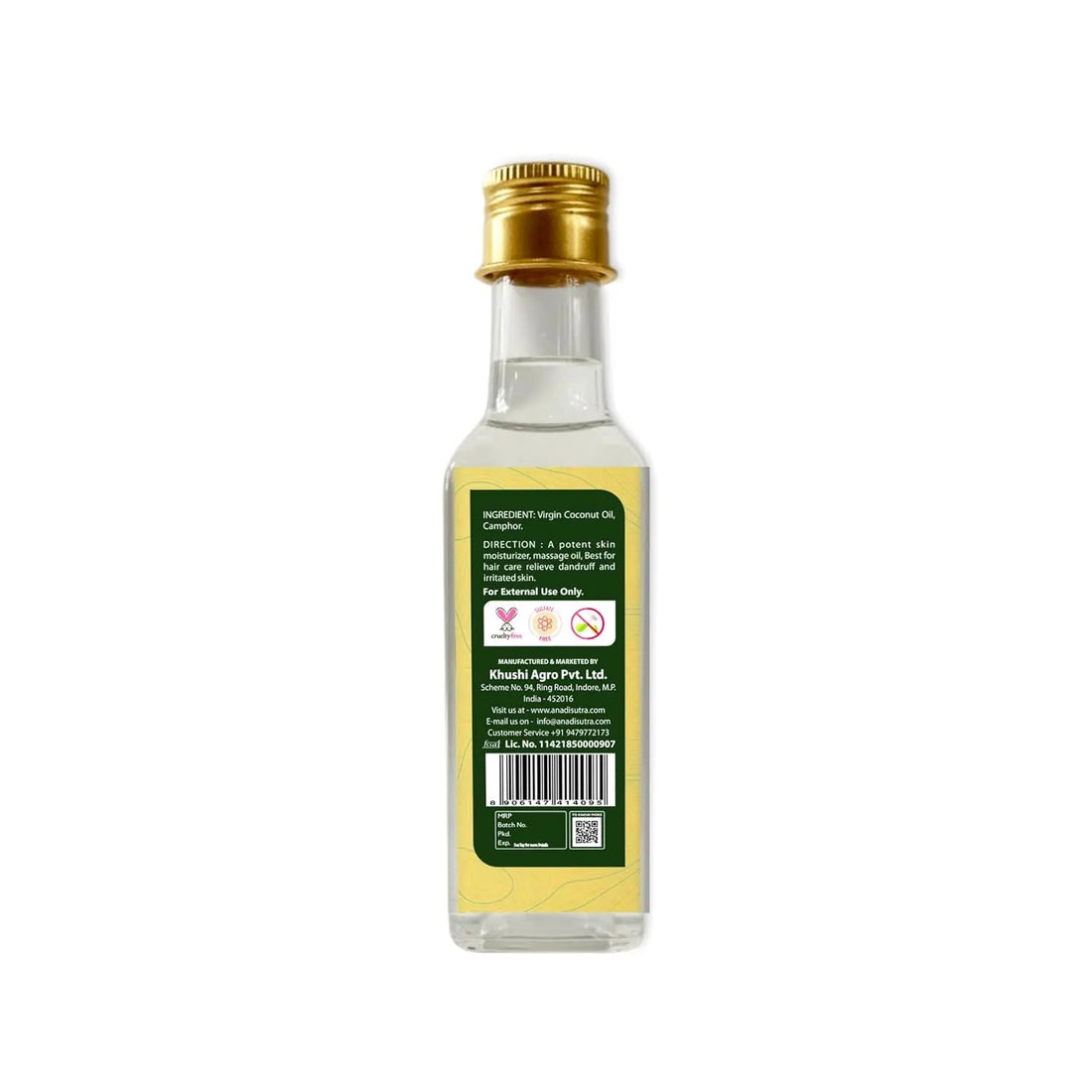 Virgin coconut camphor oil bottle with gold cap, back label facing viewer