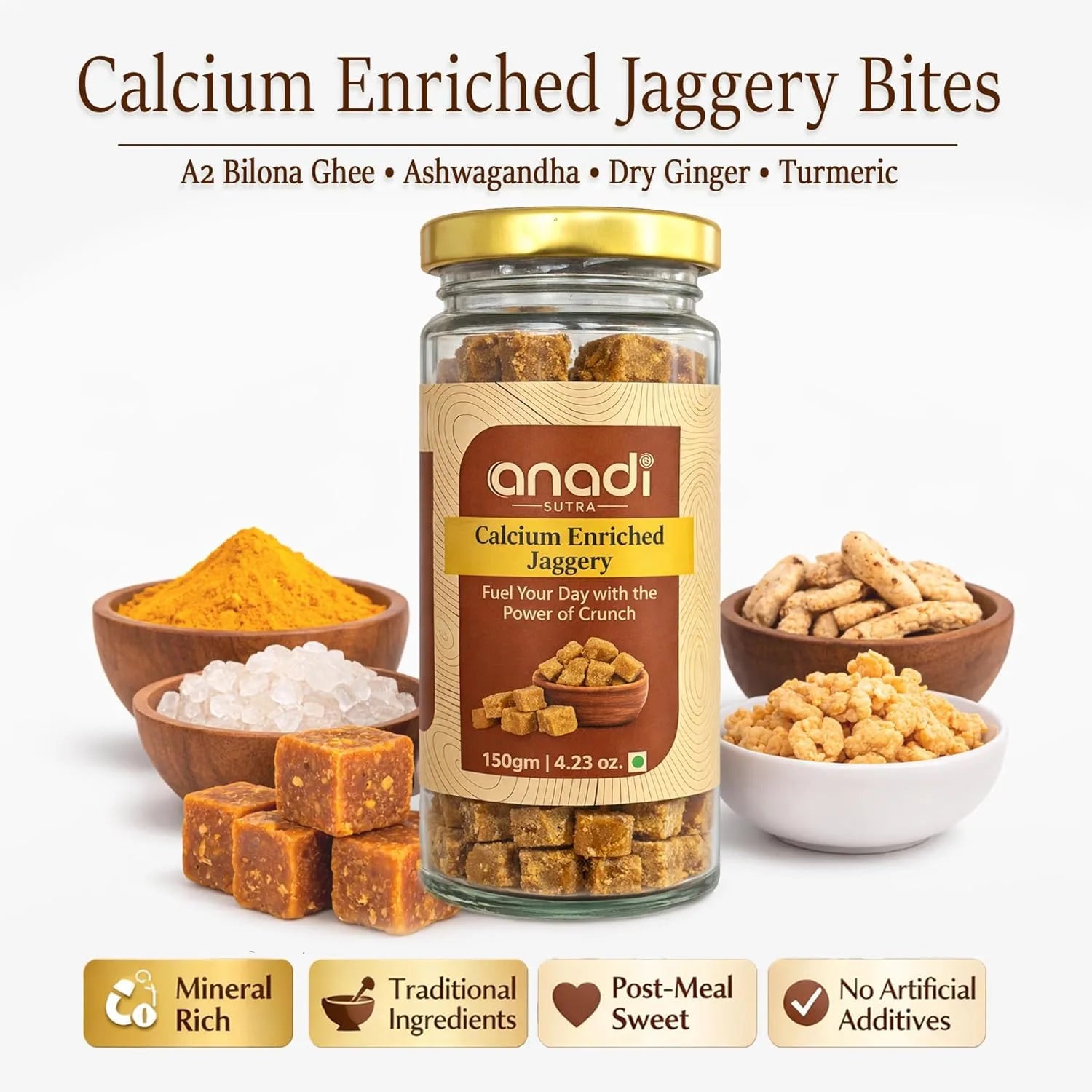 Calcium enriched jaggery jar with gold lid, jaggery cubes and assorted bites around it