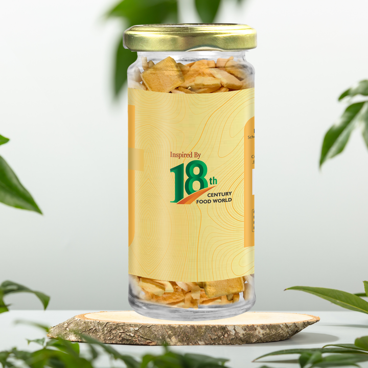Mango chips jar with 18th century food world label, gold lid, visible snack slices