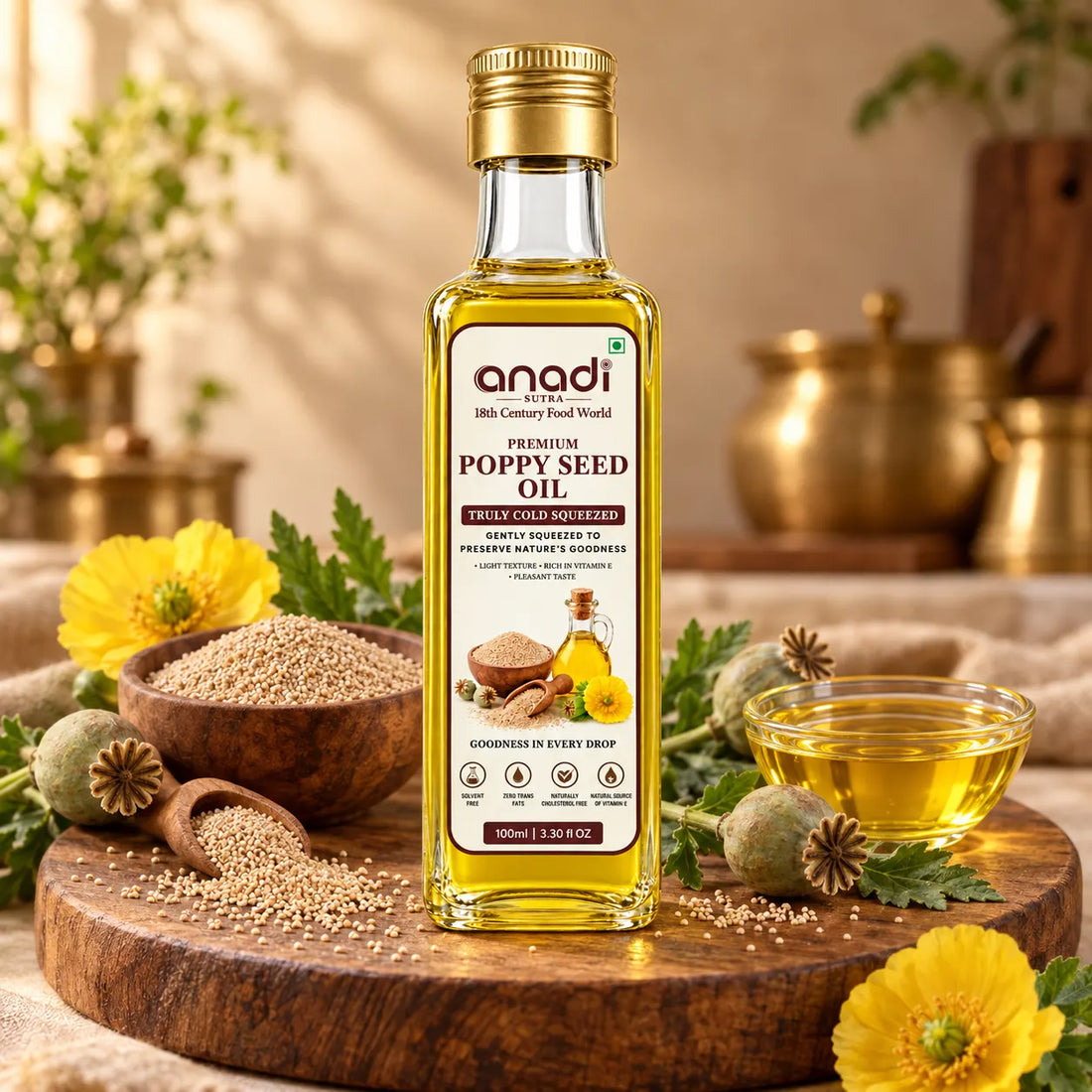 Poppy seed oil bottle with gold cap and clear glass containing golden oil