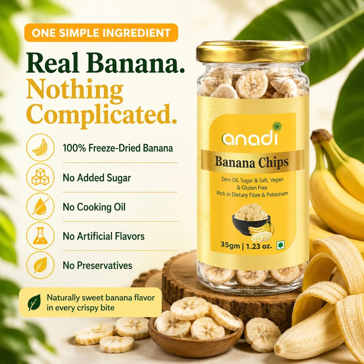 Banana chips jar with gold cap and yellow label, with banana slices on wooden stand