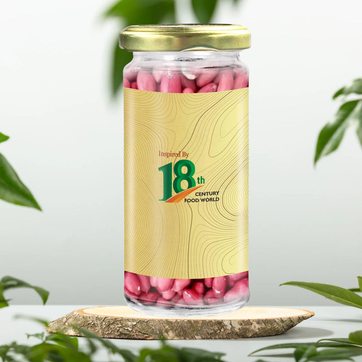 anadi Red Peanuts jar front label with 18th century badge, gold lid and red peanuts