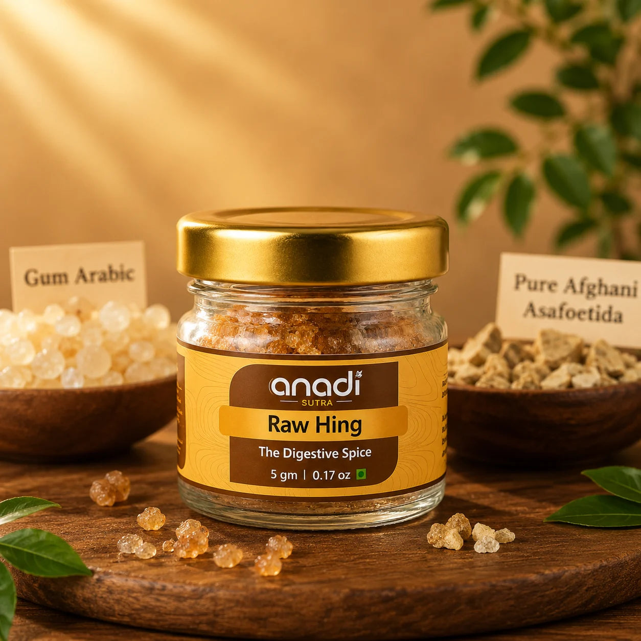 Anandi Sutra Raw Hing glass jar with gold lid and coarse brown hing crystals